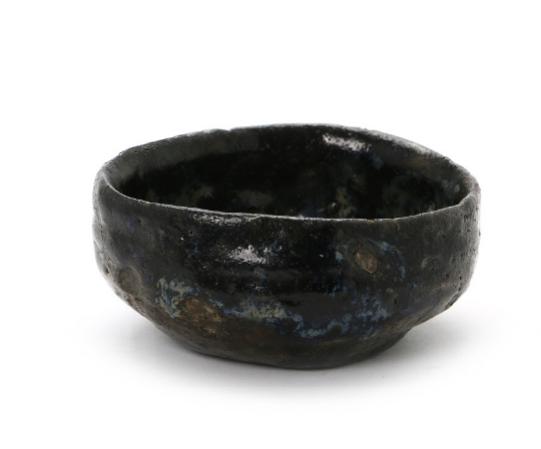 a-small-stoneware-bowl-decorated-with-blue