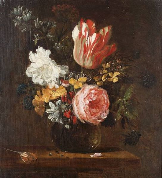 a-parrot-tulip-roses-hyacinths-and-other-flowers-in-a-glass-vase-on-a-wooden-table