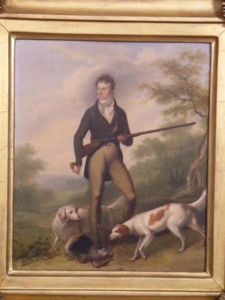portrait-of-a-sportsman-with-his-dogs-a-wooded-landscape