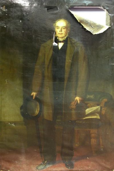 portrait-of-s-s-bankart-esq-standing-full-length-in-a-brown-coat-and-holding-a-top-hat-and-rolled-umbrella