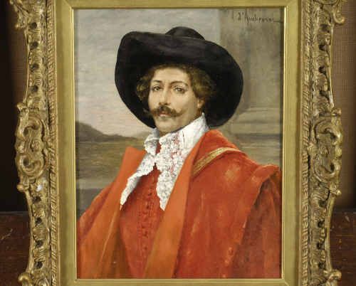 portrait-of-a-cavalier-half-length-wearing-a-red-tunic-and-cloak-with-lace-collar