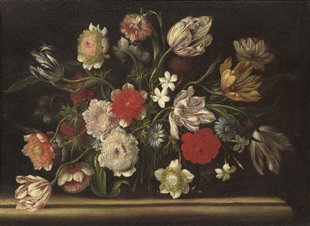 tulips-carnations-roses-and-other-flowers-on-a-stone-ledge