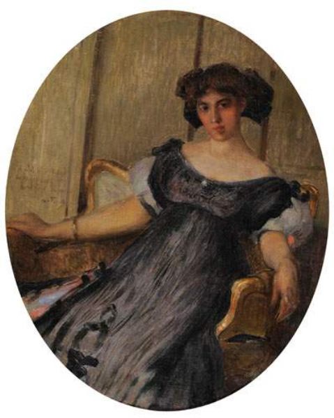 jeune-elegante-assise-dans-un-fauteuil-1907