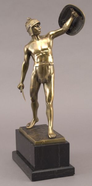 modeled-as-a-roman-soldier-having-a-gold-patina-atop-a-black-marble-plinth
