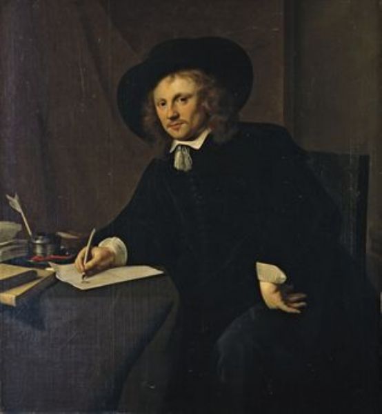 portrait-d-homme-a-sa-table-de-travail