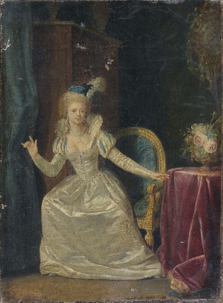 jeune-femme-assise-dans-un-salon