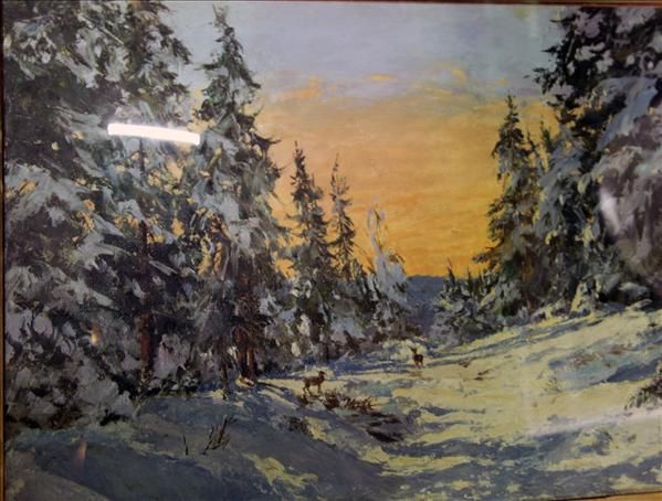 deer-in-snowy-woods-with-sunset-beyond