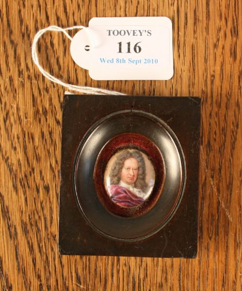oval-miniature-portrait-of-a-gentleman-wearing-a-purple-velvet-jacket