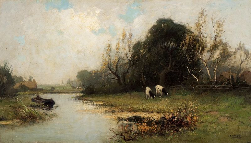 cows-grazing-by-the-water-s-edge