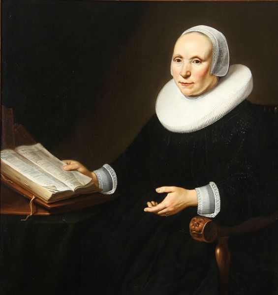 portrait-of-a-lady-in-a-chair-holding-a-book