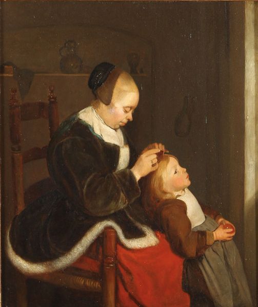 mother-combing-a-child-s-hair