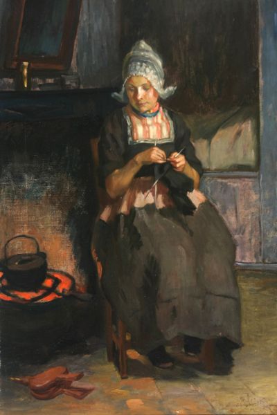 young-woman-knitting-beside-a-hearth