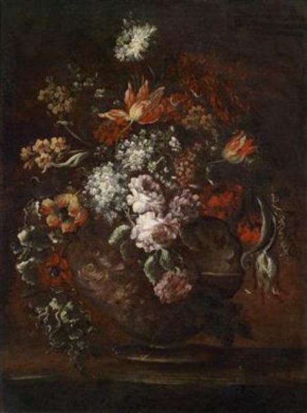 a-large-bouquet-of-flowers-in-a-globular-glass-vase