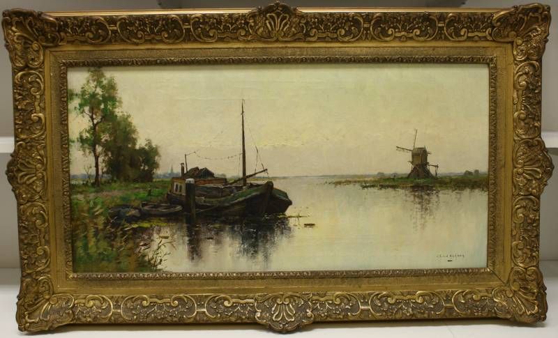 molen-en-boot-op-de-nieuwkoopse-plas-de-kunstenaar-had-hier-een-woonboot