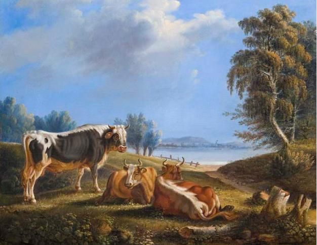 kuhe-in-romantischer-seelandschaft