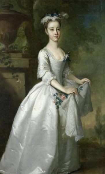 portrait-of-martha-fursman-full-length-in-a-white-dress-standing-in-a-landscape-beside-an-urn-on-a-plinth