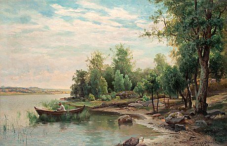 view-of-a-lake-with-angling-man-in-a-boat
