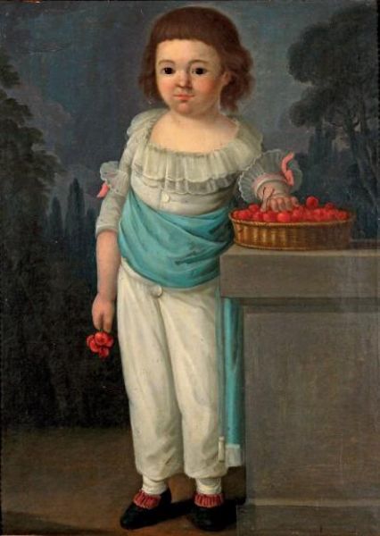 portrait-d-un-jeune-garcon-pres-d-un-panier-de-cerises
