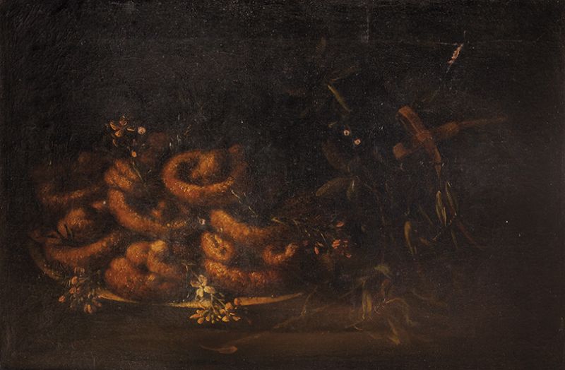 doughnuts-in-a-ceramic-plate-and-orange-flowers-ona-table