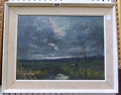 cattle-grazing-in-a-stormy-landscape