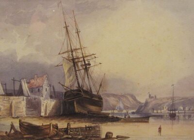boat-beached-by-the-harbour-wall