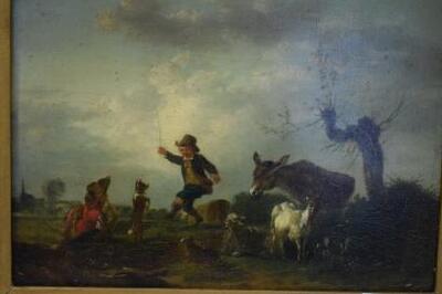 deux-petits-patres-gardant-un-ane-et-des-chevres-dans-une-prairie-font-danser-un-petit-chien