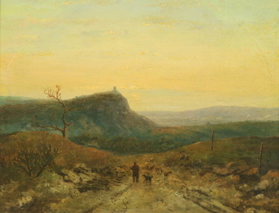 herder-in-heuvellandschap-bij-ondergaande-zon