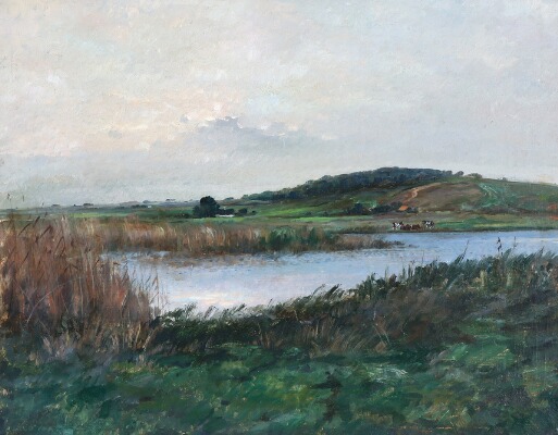 hilly-landscape-with-grazing-cows-at-a-stream