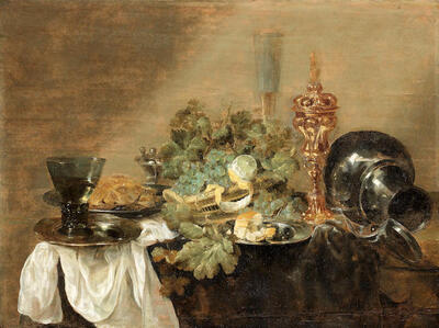 grapes-and-a-peeled-lemon-in-a-basket-with-bread-dressed-crab-and-a-roemer-of-wine-on-pewter-plates-together-with-a-gilt-cup-a