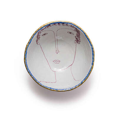 pink-bowl-with-face-motif